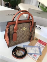 حقيبة كوتش بني