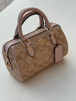 حقيبة كوتش روان بيج أطراف وردي