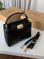 حقيبة كوتش إليزا اسود