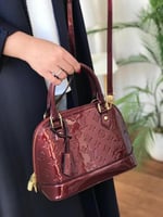 حقيبه لوي فيتون عنابي لمعة