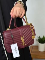 حقيبة سان لوران عنابي