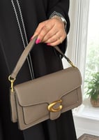 حقيبة كوتش تابي بني