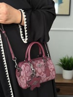 حقيبة كوتش عنابي