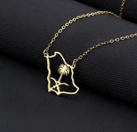 تعليقة بشعار الملكة العربية السعودية