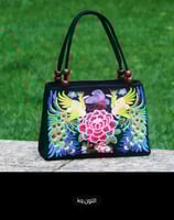 حقيبة يد مطرزة بالزهور