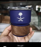 كوب قهوة بشعار السعودية