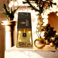 كتابة على العود مع عطر فرنسي في علبة فخمة