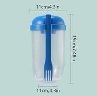 علبة طعام مع شوكة وعلبة صغيرة للصلصات