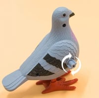 لعبة متحركة للصغار بشكل طير الحمامة ،