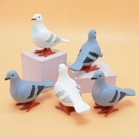 لعبة متحركة للصغار بشكل طير الحمامة ،