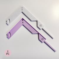 قطعتين من مسطرة تصميم الدفتر