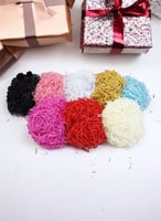 قصاصات ورق مموج لتغليف الهدايا (100 جرام)