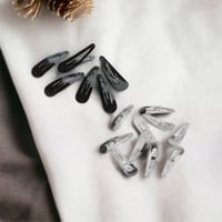 بكلة مسكة شعر طق طق ( 50 حبة )