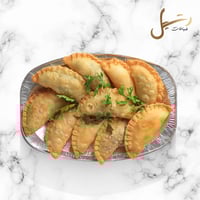 سمبوسة مفرزنة - جبنه سائله