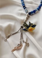 سبحة 33 عقيق برازيلي أزرق مزينة بوردة أويا كروشيه