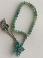 سبحة 33 عقيق برازيلي أخضر مزينة بوردة أويا كروشيه