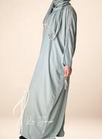 شرشف سستة رمادي على اخضر مزين بالكروشيه ذهبي من لا...