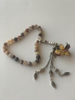 سبحة 33 عقيق برازيلي أزرق فيروزي مزينة بوردة أويا...