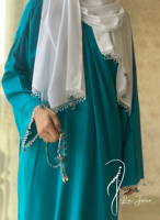 شرشف صلاة لف تركواز مزين بالكروشيه و الورد الاويا