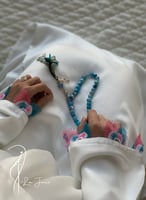 شرشف صلاة لف أبيض اويا أزرق وفوشي