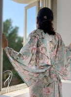 فستان حرير اخضر درابيه فري سايز يلبس بعدة طرق طوبي