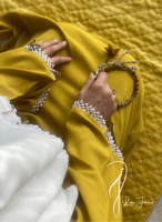 شرشف صلاة لف كموني أصفر مستردة مزين بالكروشيه و ال...