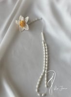 سبحة 33 عظم مزينة بالكروشيه