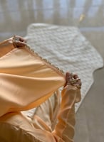 شرشف صلاة لف خربزي مزين بالكروشيه البيج و الاوف وا...