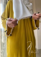 شرشف صلاة لف كموني أصفر مستردة مزين بالكروشيه و ال...