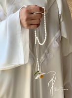 سبحة 33 عظم مزينة بالكروشيه