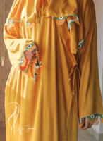 شرشف صلاة لف اصفر مزين بأويا يدوي اخضر و ابيض من ل...