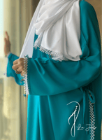 شرشف صلاة لف تركواز مزين بالكروشيه و الورد الاويا