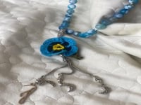 سبحة 33 عقيق برازيلي أزرق مزينة بوردة أويا كروشيه