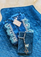 شرشف صلاة لف أزرق فيروزي مزين بأويا اليدوي فوشي