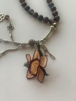 سبحة 33 عقيق برازيلي بني مزينة بوردة أويا كروشيه