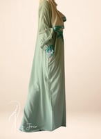 شرشف صلاة باتيك سستة اخضر الطرحة مثبتة .