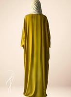 شرشف صلاة باتيك سستة اصفر مسترد و الطرحة مثبتة.