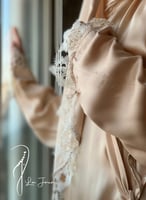 شرشف صلاة لف بيج مزين بالاويا