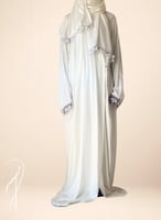 شرشف صلاة لف ابيض مزين بالاويا الفضي