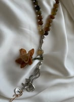 سبحة 33 عقيق برازيلي بني وبيج مزينة بوردة أويا كرو...