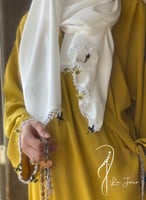 شرشف صلاة لف كموني أصفر مستردة مزين بالكروشيه و ال...