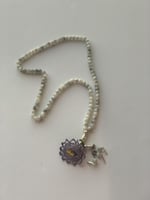 سبحة ٩٩ رمادي مزينة بوردة أويا