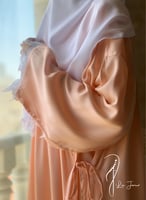 شرشف صلاة اويا ورد لف خربزي و الطرحة منفصلة .