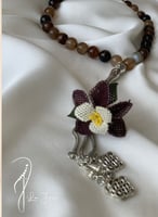 سبحة 33 عقيق برازيلي بني رخامي مزينة بوردة أويا كر...