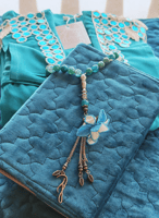 شرشف صلاة لف أزرق فيروزي مزين اويا يدوي مع ترتر