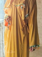 شرشف صلاة لف اصفر مزين بأويا يدوي اخضر و ابيض من ل...