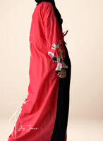 شرشف صلاة لف منقوش فوشي واسود و الطرحة مثبتة .