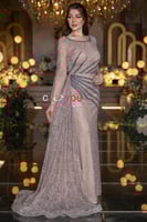 فستان سهرة فيروزي مطرز بأكمام تل واسعة