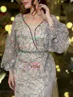 فستان سهرة 7194 شامبين مطرّز برقبة V وأكمام شفافة...