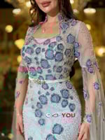 فستان سهرة 7256 تيفاني بتطريز أزرق لامع يمنحك حضور...